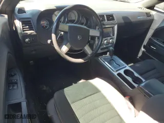 2009 Dodge Challenger SE with VIN 2B3LJ44V49H542199, listed as a Copart auction lot 50326325 with 124,536 mi miles and Salvage Title. Bid and sale history available at carsss.com. Image 8.