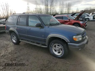 1999 Ford Explorer XL with VIN 1FMDU32E7XUC25465, listed as a Copart auction lot 83651354 with 93,850 mi miles and Clean title. Bid and sale history available at DreamBid. Image 4.