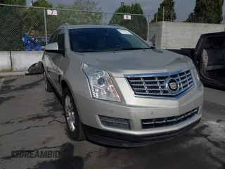 2015 Cadillac SRX Luxury Collection with VIN 3GYFNEE33FS548324, listed as a IAAI auction lot 42029979 with 70,372 mi miles. Bid and sale history available at carsss.com. Image 1.