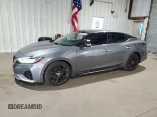 2019 Nissan Maxima SR z VIN 1N4AA6AV2KC360313, wystawiony jako Copart lot #52401595 z przebiegiem 67 822 mil mil oraz Czysty tytuł • Clean title. Historia ofert i sprzedaży dostępna na DreamBid. Obrazek 1.