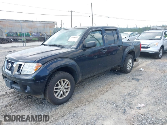 2015 Nissan Frontier S with VIN 1N6AD0EV2FN735908, listed as a IAAI auction lot 42388456 with 164,889 mi miles and . Bid and sale history available at DreamBid. Image 2.