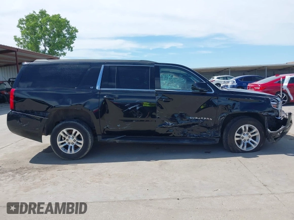 2020 Chevrolet Suburban LT z VIN 1GNSCHKC2LR305366, wystawiony jako IAAI lot #42080587 z przebiegiem 163 540 mil mil oraz . Historia ofert i sprzedaży dostępna na DreamBid. Obrazek 13.