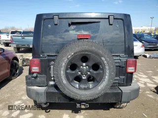 2014 Jeep Wrangler Unlimited Sahara with VIN 1C4BJWEG1EL107711, listed as a Copart auction lot 46976855 with 0 mi miles and Salvage Title. Bid and sale history available at carsss.com. Image 6.