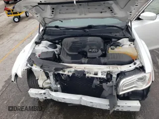 2014 Chrysler 300 z VIN 2C3CCAAG7EH148451, wystawiony jako Copart lot #54672815 z przebiegiem 154 241 mil mil oraz Szkoda całkowita • Salvage title. Historia ofert i sprzedaży dostępna na DreamBid. Obrazek 11.