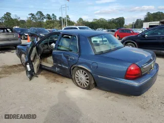 2011 Mercury Grand Marquis LS with VIN 2MEBM7FVXBX608636, listed as a Copart auction lot 82684944 with 157,843 mi miles and Salvage Title. Bid and sale history available at carsss.com. Image 2.