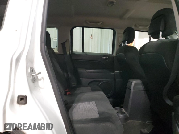 2015 Jeep Patriot Latitude with VIN 1C4NJRFB6FD395965, listed as a Copart auction lot 59615285 with 128,112 mi miles and Non repairable. Bid and sale history available at DreamBid. Image 11.