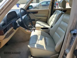 1991 Mercedes-Benz 560 with VIN WDBCA39E9MA599487, listed as a Copart auction lot 51921915 with 59,132 mi miles and Salvage Title. Bid and sale history available at DreamBid. Image 7.