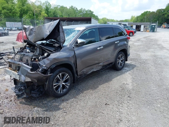 2019 Toyota Highlander LE with VIN 5TDBZRFH5KS722354, listed as a IAAI auction lot 42252775 with 97,141 mi miles and . Bid and sale history available at DreamBid. Image 2.