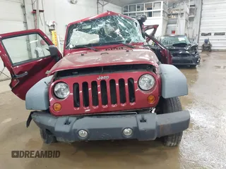 2011 Jeep Wrangler Sport z VIN 1J4AA2D19BL613164, wystawiony jako IAAI lot #42514207 z przebiegiem Nie podano mil oraz . Historia ofert i sprzedaży dostępna na DreamBid. Obrazek 11.