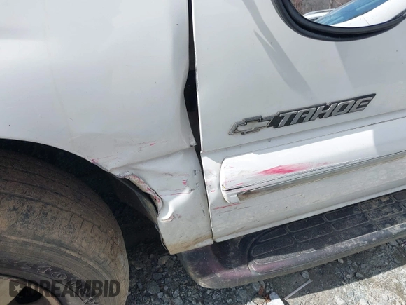 2001 Chevrolet Tahoe LS with VIN 1GNEC13T51J311841, listed as a IAAI auction lot 41633746 with Not provided miles and . Bid and sale history available at DreamBid. Image 13.
