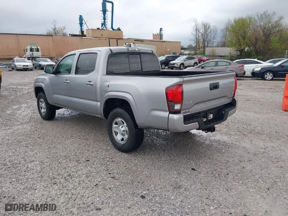 2020 Toyota Tacoma 4WD SR5 with VIN 3TMCZ5AN2LM300117, listed as a IAAI auction lot 41874864 with 59,594 mi miles. Bid and sale history available at carsss.com. Image 3.