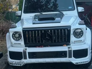 2002 Mercedes-Benz G-Class with VIN WDCYR49E22X132146, listed as a Copart auction lot 85449444 with 208,917 mi miles and Salvage Title. Bid and sale history available at carsss.com. Image 2.