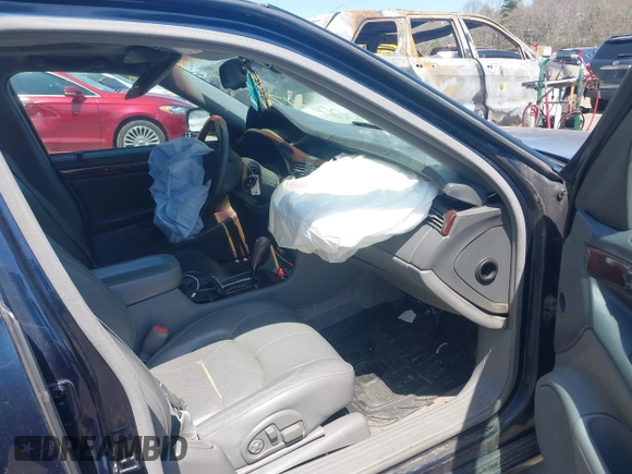 2002 Cadillac DeVille DTS with VIN 1G6KF57912U205527, listed as a IAAI auction lot 42064174 with 135,002 mi miles. Bid and sale history available at carsss.com. Image 5.