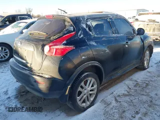 2013 Nissan Juke S with VIN JN8AF5MR8DT209858, listed as a IAAI auction lot 41341442 with 125,367 mi miles. Bid and sale history available at carsss.com. Image 4.