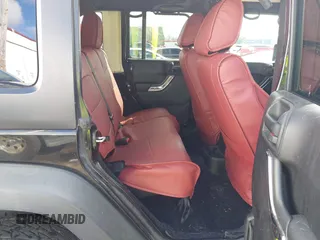 2011 Jeep Wrangler Unlimited Rubicon with VIN 1J4BA6H13BL513311, listed as a IAAI auction lot 41809207 with 124,716 mi miles and . Bid and sale history available at DreamBid. Image 8.