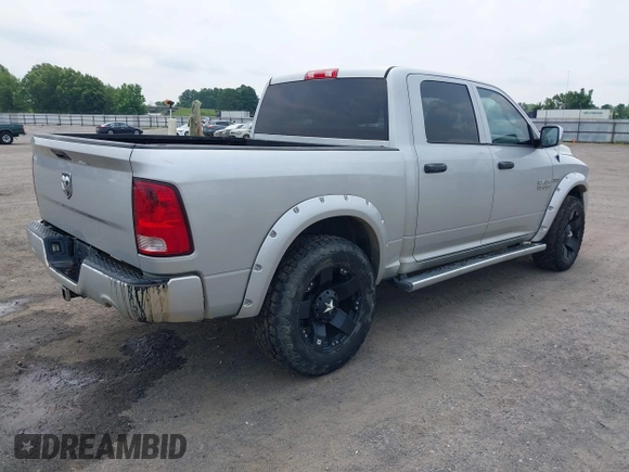 2014 Ram 1500 Express with VIN 3C6RR6KT9EG219721, listed as a IAAI auction lot 42385648 with 168,233 mi miles and . Bid and sale history available at DreamBid. Image 4.