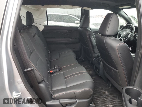 2023 Honda Passport TrailSport with VIN 5FNYF8H64PB044233, listed as a Copart auction lot 53522015 with 10,458 mi miles and Salvage title. Bid and sale history available at DreamBid. Image 10.