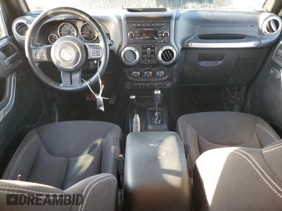2015 Jeep Wrangler Unlimited Sahara with VIN 1C4BJWEG2FL690498, listed as a Copart auction lot 73598124 with 143,564 mi miles and Salvage Title. Bid and sale history available at carsss.com. Image 8.