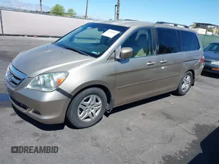 2007 Honda Odyssey EX z VIN 5FNRL38407B123509, wystawiony jako IAAI lot #42238353 z przebiegiem 200 111 mil mil oraz . Historia ofert i sprzedaży dostępna na DreamBid. Obrazek 2.