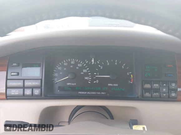 1993 Cadillac Seville STS z VIN 1G6KY5298PU821640, wystawiony jako IAAI lot #42269233 z przebiegiem 126 662 mil mil oraz . Historia ofert i sprzedaży dostępna na DreamBid. Obrazek 7.