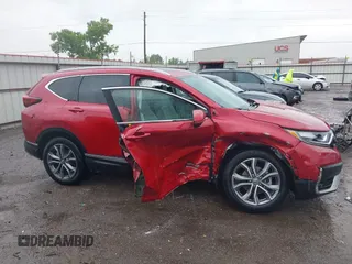 2021 Honda CR-V Touring with VIN 2HKRW2H9XMH663315, listed as a IAAI auction lot 42188893 with 26,203 mi miles and . Bid and sale history available at DreamBid. Image 13.