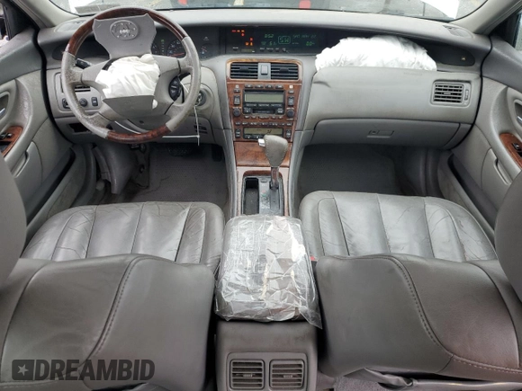 2004 Toyota Avalon XL z VIN 4T1BF28B94U380488, wystawiony jako Copart lot #57809445 z przebiegiem 103 078 mil mil oraz Szkoda całkowita • Salvage title. Historia ofert i sprzedaży dostępna na DreamBid. Obrazek 8.