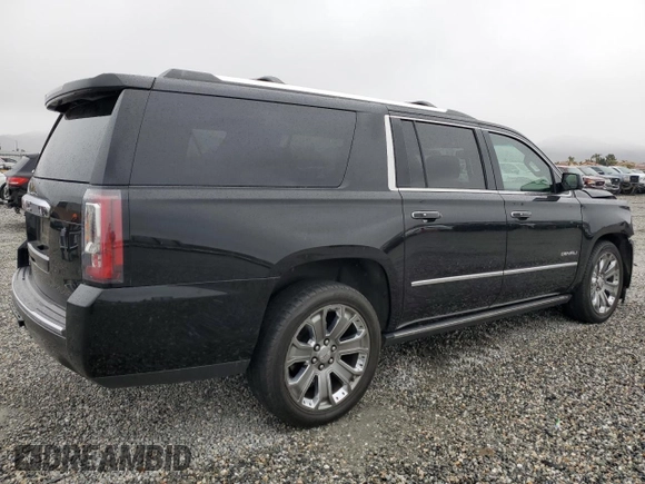 2016 GMC Yukon XL Denali with VIN 1GKS2HKJ1GR199710, listed as a Copart auction lot 49172615 with 261,856 mi miles and Salvage Title. Bid and sale history available at DreamBid. Image 3.