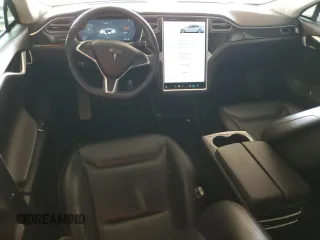 2016 Tesla Model S 90D with VIN 5YJSA1E29GF120543, listed as a Copart auction lot 56574425 with 56,412 mi miles and Salvage title. Bid and sale history available at DreamBid. Image 8.