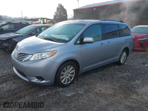 2017 Toyota Sienna LE with VIN 5TDJZ3DC6HS184126, listed as a IAAI auction lot 41166135 with 101,305 mi miles. Bid and sale history available at carsss.com. Image 2.