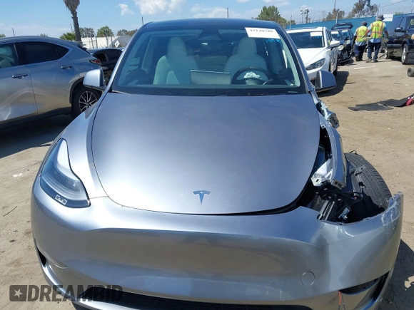 2024 Tesla Model Y Performance with VIN 7SAYGDEF9RA299036, listed as a IAAI auction lot 42140788 with 14,844 mi miles and . Bid and sale history available at DreamBid. Image 11.