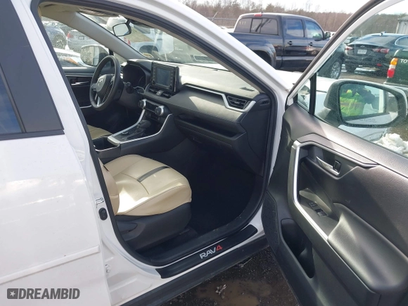 2022 Toyota RAV4 Hybrid XLE with VIN 4T3RWRFV3NU051850, listed as a IAAI auction lot 41571914 with 55,584 mi miles. Bid and sale history available at carsss.com. Image 5.