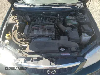 2002 Mazda Protege DX with VIN JM1BJ225121567924, listed as a Copart auction lot 54847545 with 93,653 mi miles and Salvage Title. Bid and sale history available at DreamBid. Image 11.
