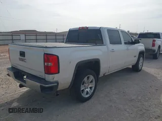 2017 GMC Sierra 1500 SLE z VIN 3GTP1MEC3HG198599, wystawiony jako IAAI lot #41793527 z przebiegiem 143 207 mil mil oraz . Historia ofert i sprzedaży dostępna na DreamBid. Obrazek 4.