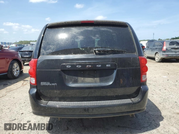 2015 Dodge Grand Caravan American Value with VIN 2C4RDGBG7FR703916, listed as a Copart auction lot 54830915 with 197,539 mi miles and Clean Title. Bid and sale history available at DreamBid. Image 6.