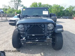 2020 Jeep Wrangler Unlimited Sahara High Altitude with VIN 1C4HJXEGXLW182581, listed as a IAAI auction lot 42612084 with 52,656 mi miles and . Bid and sale history available at DreamBid. Image 13.