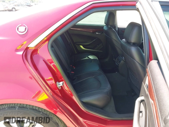 2012 Cadillac CTS Performance with VIN 1G6DJ5E31C0107905, listed as a IAAI auction lot 42131940 with 108,015 mi miles and . Bid and sale history available at DreamBid. Image 8.