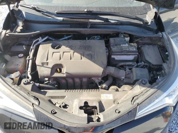 2019 Toyota C-HR XLE z VIN JTNKHMBX9K1016158, wystawiony jako Copart lot #54121995 z przebiegiem 119 716 mil mil oraz Szkoda całkowita • Salvage title. Historia ofert i sprzedaży dostępna na DreamBid. Obrazek 12.