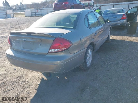 2007 Ford Taurus SEL with VIN 1FAFP56U77A161159, listed as a IAAI auction lot 41284533 with 162,883 mi miles. Bid and sale history available at carsss.com. Image 4.