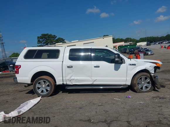 2019 Ford F-150 XL with VIN 1FTEW1C47KKE22590, listed as a IAAI auction lot 42418181 with 123,197 mi miles and . Bid and sale history available at DreamBid. Image 13.