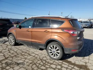 2017 Ford Escape Titanium with VIN 1FMCU9JDXHUA78843, listed as a Copart auction lot 42809485 with 93,562 mi miles and Salvage Title. Bid and sale history available at carsss.com. Image 2.