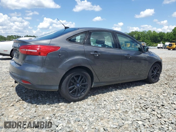 2016 Ford Focus SE with VIN 1FADP3F29GL233719, listed as a Copart auction lot 56857705 with 140,785 mi miles and Salvage title. Bid and sale history available at DreamBid. Image 3.