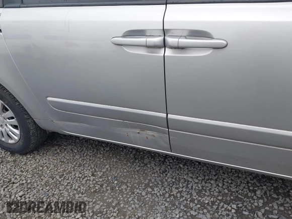 2011 Kia Sedona LX with VIN KNDMG4C7XB6363483, listed as a IAAI auction lot 41884439 with 243,076 mi miles. Bid and sale history available at carsss.com. Image 6.
