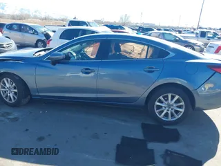 2016 Mazda 6 i Sport with VIN JM1GJ1U57G1451597, listed as a IAAI auction lot 41658184 with 142,504 mi miles and . Bid and sale history available at DreamBid. Image 14.