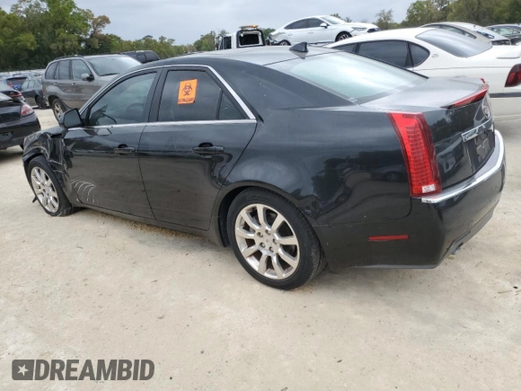 2009 Cadillac CTS AWD w/1SA with VIN 1G6DH577590123416, listed as a Copart auction lot 48297495 with 142,728 mi miles and Salvage Title. Bid and sale history available at carsss.com. Image 2.