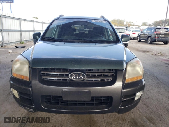 2005 Kia Sportage LX with VIN KNDJF723957135799, listed as a Copart auction lot 76531124 with 278,886 mi miles and Clean Title. Bid and sale history available at carsss.com. Image 5.