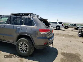 2014 Jeep Grand Cherokee Limited with VIN 1C4RJFBM3EC384398, listed as a Copart auction lot 57703835 with 153,255 mi miles and Salvage title. Bid and sale history available at DreamBid. Image 14.