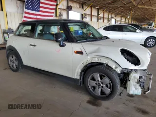 2014 MINI Hardtop with VIN WMWXM5C50ET933486, listed as a Copart auction lot 50823865 with 98,296 mi miles and Salvage Title. Bid and sale history available at DreamBid. Image 4.