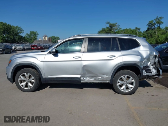 2019 Volkswagen Atlas SE with VIN 1V2UR2CA2KC557449, listed as a IAAI auction lot 42281302 with 106,739 mi miles and . Bid and sale history available at DreamBid. Image 15.