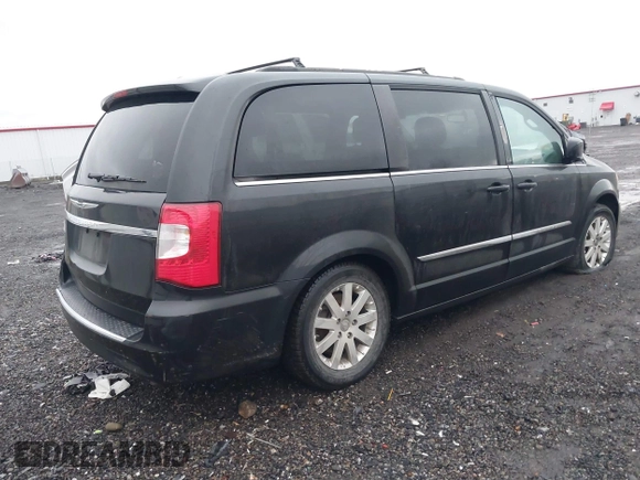 2015 Chrysler Town & Country Touring with VIN 2C4RC1BG1FR534220, listed as a IAAI auction lot 41489371 with 136,923 mi miles. Bid and sale history available at carsss.com. Image 4.