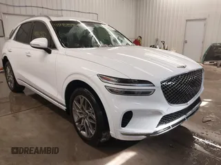 2023 Genesis GV70 2.5T with VIN KMUMADTBXPU121234, listed as a IAAI auction lot 41188550 with 27,930 mi miles. Bid and sale history available at carsss.com. Image 1.
